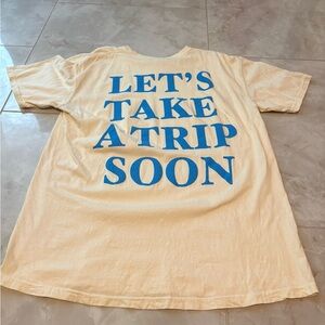 Women’s Cream T-Shirt [Print on back of shirt]